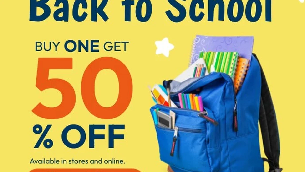 overhead view of corned beef sliced and on a platter with cabbage, potatoes, and carrots